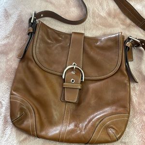 Coach crossbody. I love this bag. Nice caramel color. Nice size bag!